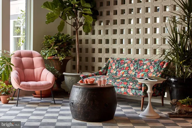 a outdoor space with lots of tables and chairs