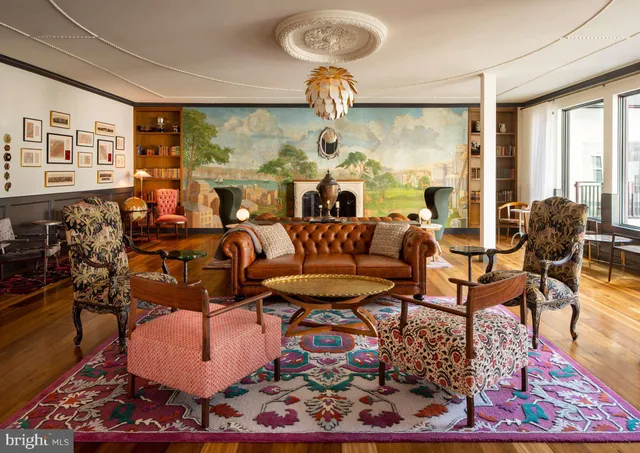 a very nice looking dining room with a table and chairs