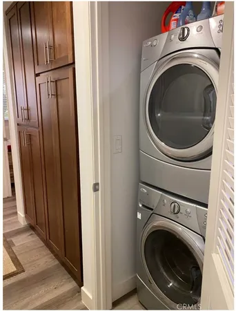 a close up view of a washer and dryer in a utility room