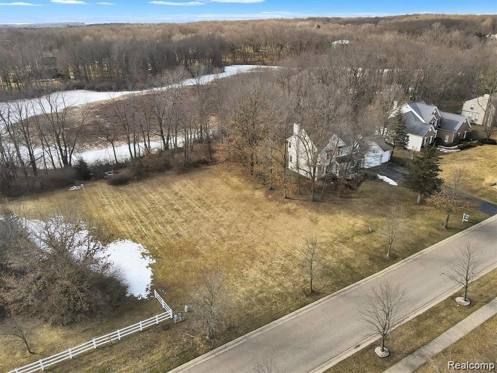 201 Timber Ridge Drive Highland, MI 48357 - Photo 38 of 39 Aerial photo of the home and extra lot