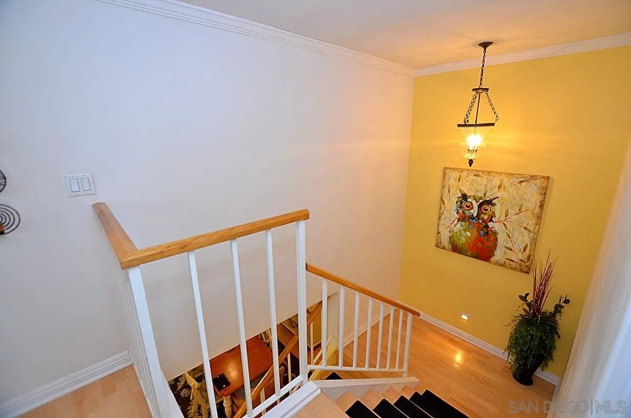 95 Port Of Spain Road Coronado, CA 92118 - Photo 14 of 40 a view of a hallway with staircase