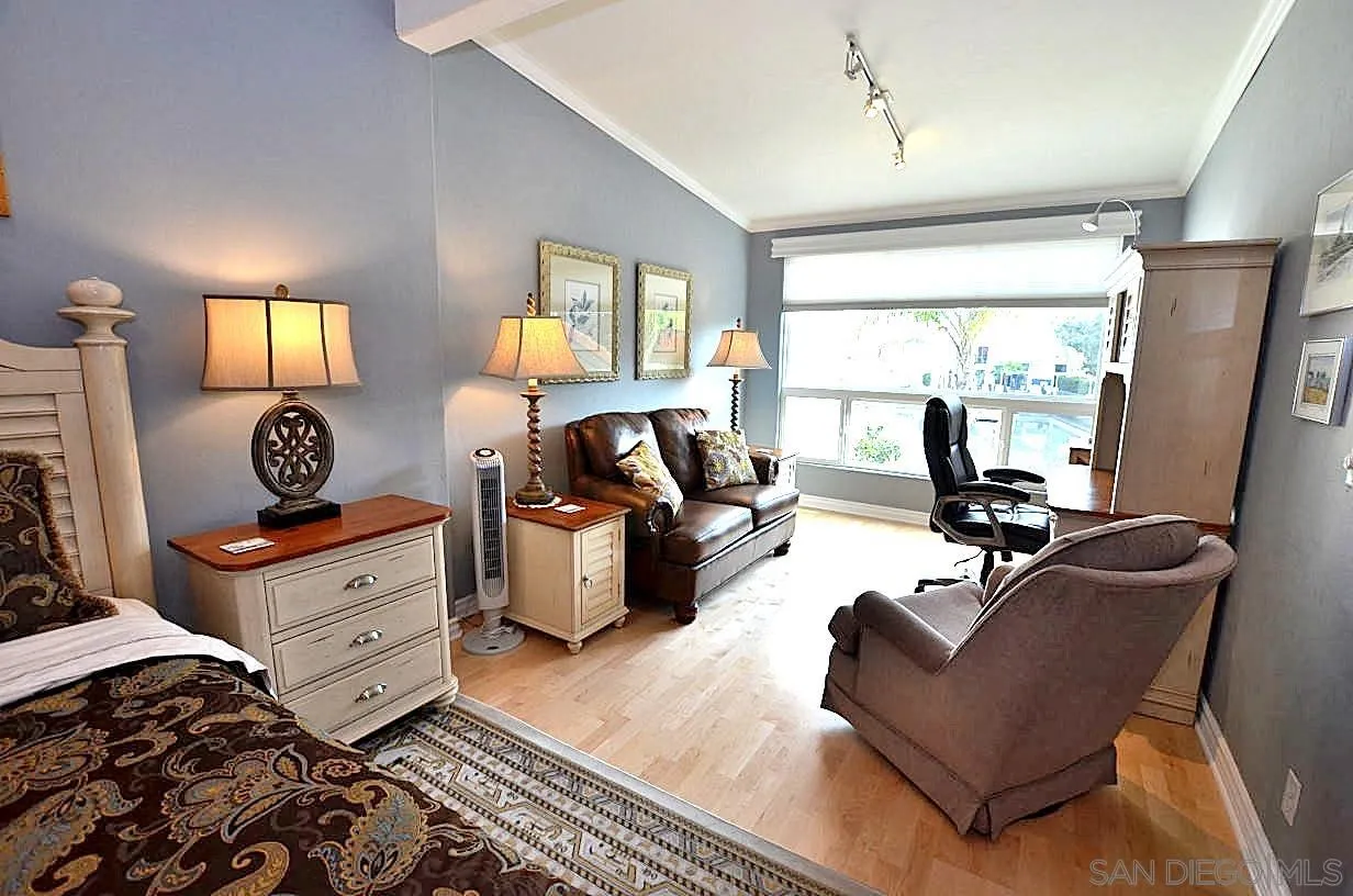 95 Port Of Spain Road Coronado, CA 92118 - Photo 18 of 40 a living room with furniture and a window