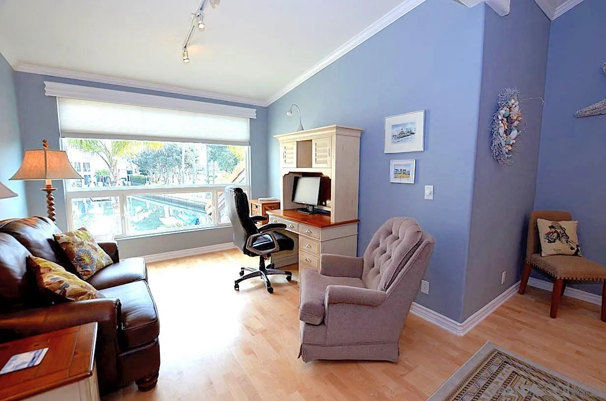 95 Port Of Spain Road Coronado, CA 92118 - Photo 19 of 40 a living room with furniture and a large window