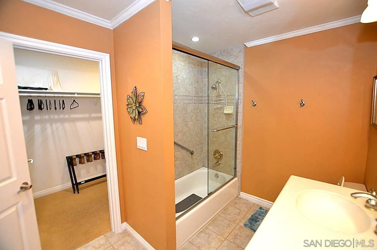 95 Port Of Spain Road Coronado, CA 92118 - Photo 22 of 40 a bathroom with a tub and shower