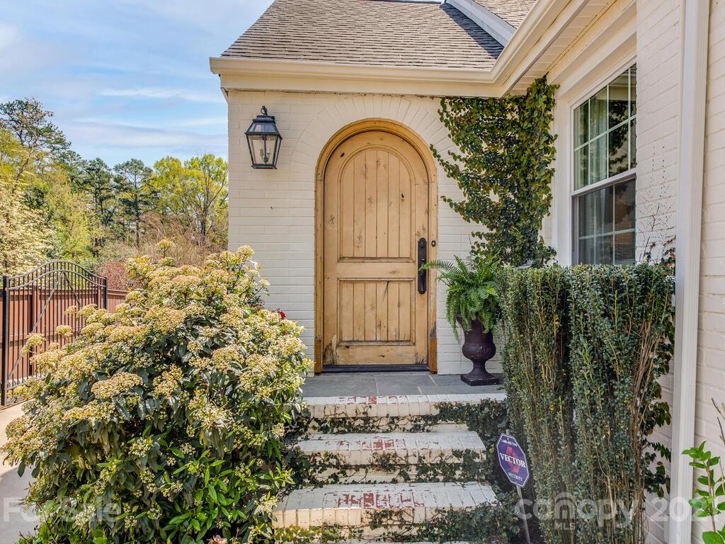 1408 Lilac Road Charlotte, NC 28209 - Photo 2 of 23 a view of a door of the house