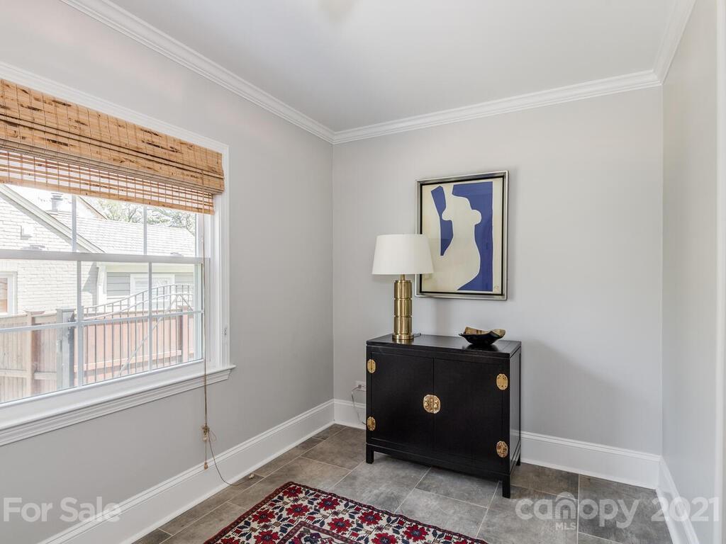 1408 Lilac Road Charlotte, NC 28209 - Photo 4 of 23 a living room with furniture and a window