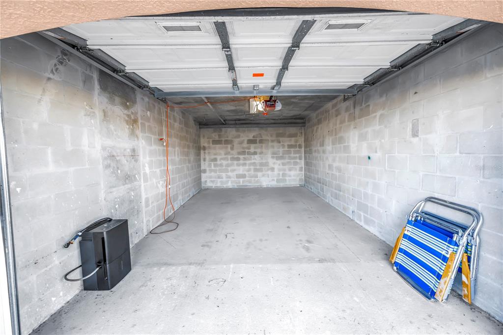 16326 Gulf Boulevard, Unit 308 Redington Beach, FL 33708 - Photo 5 of 44 a view of empty room with a ceiling fan