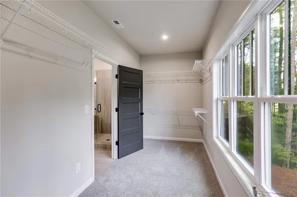 a view of a kitchen from the hallway