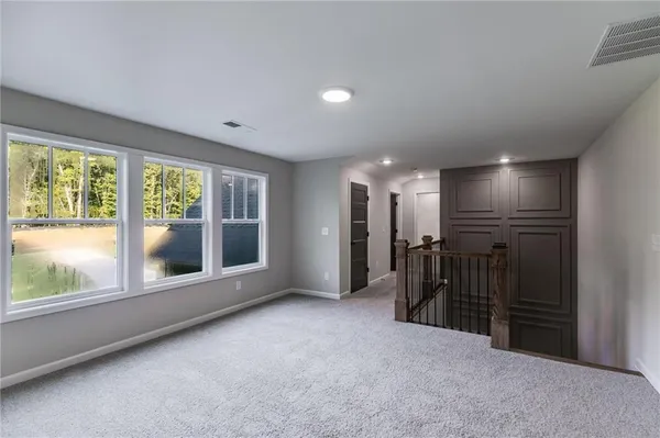 a view of hallway with stairs