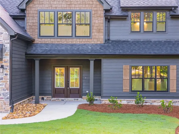 a front view of a house having yard