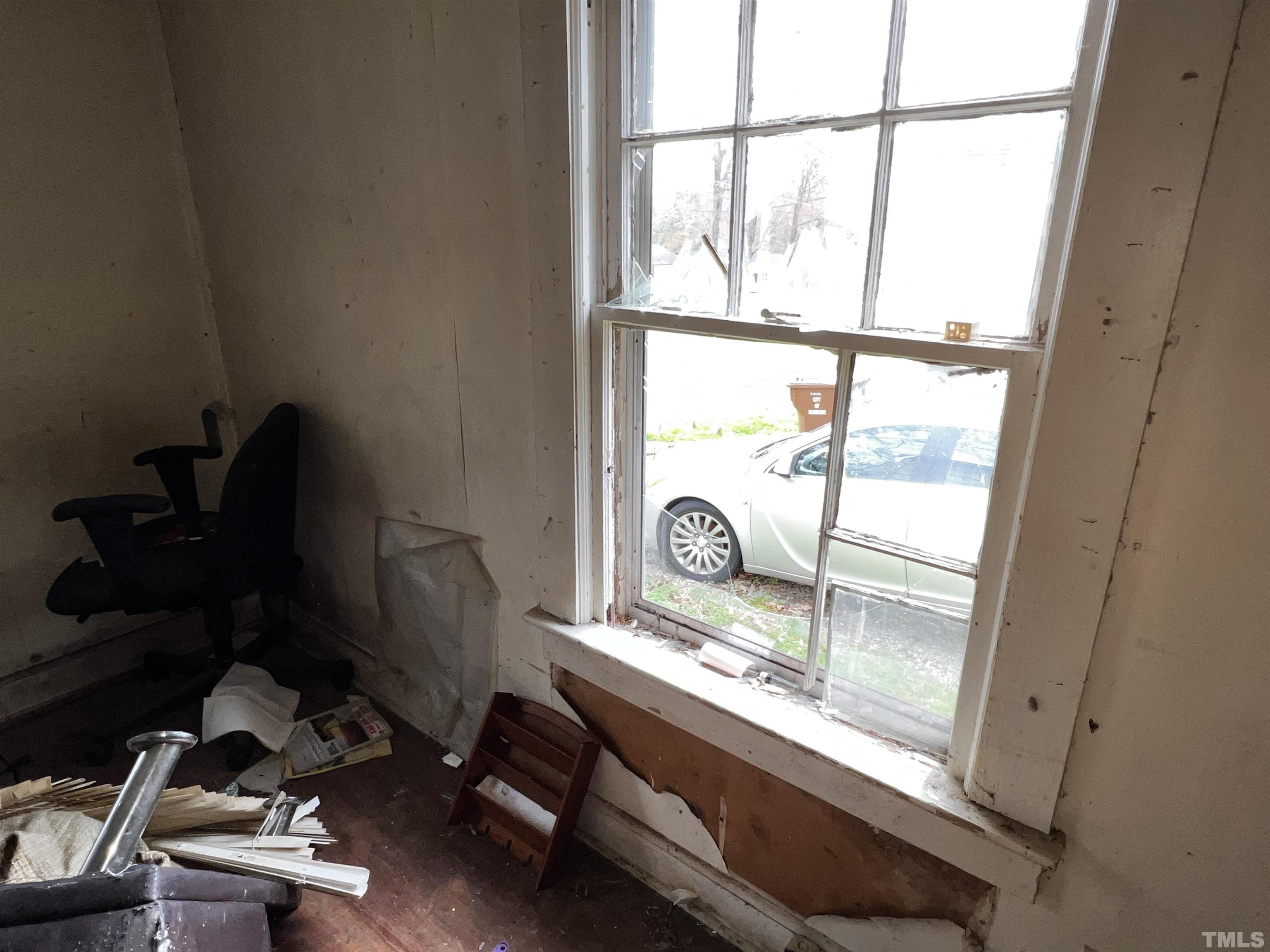 1259 Pointer Street Roxboro, NC 27573 - Photo 22 of 47 a room with furniture and a window