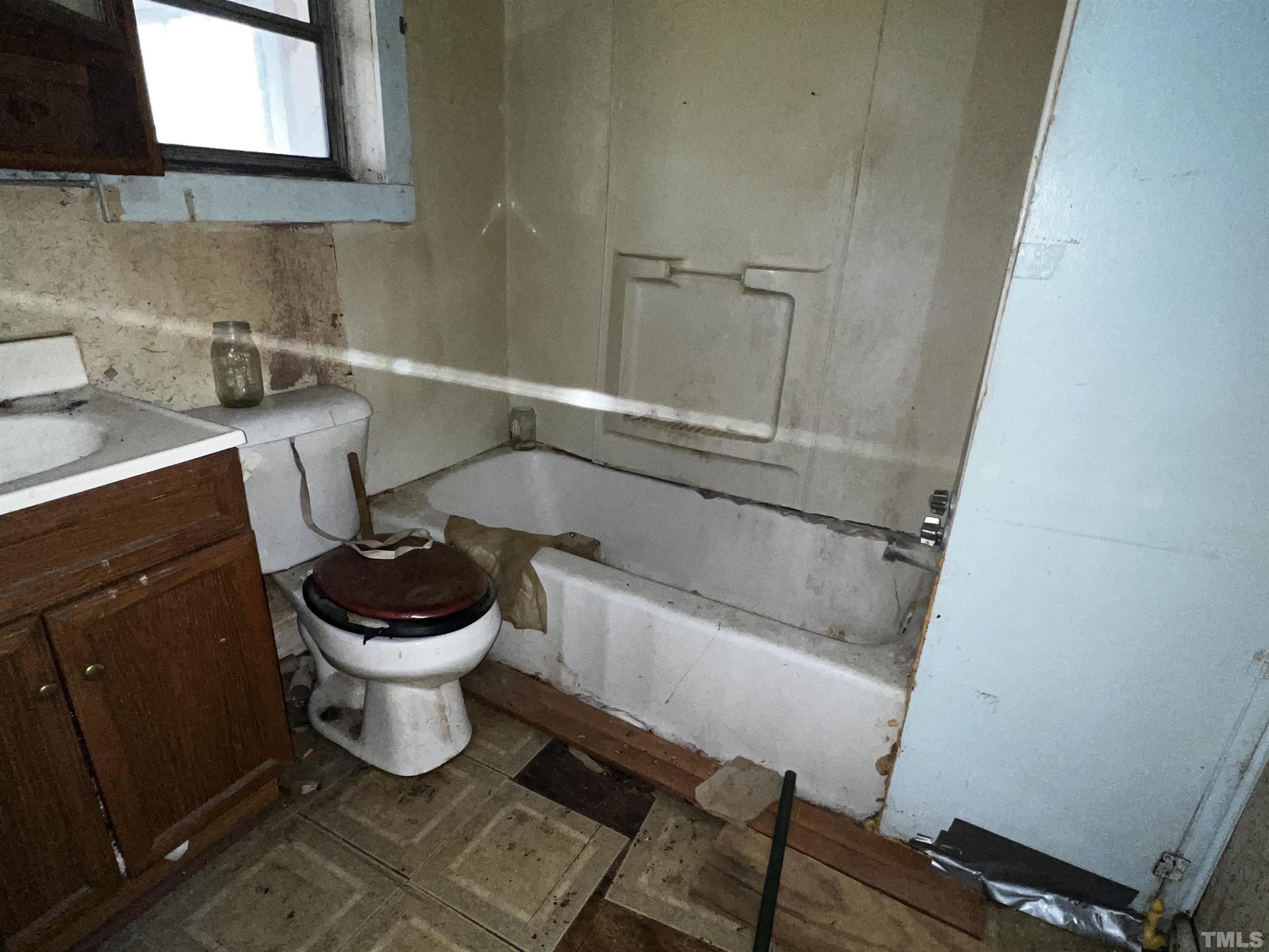1259 Pointer Street Roxboro, NC 27573 - Photo 29 of 47 a bathroom with a sink and a toilet