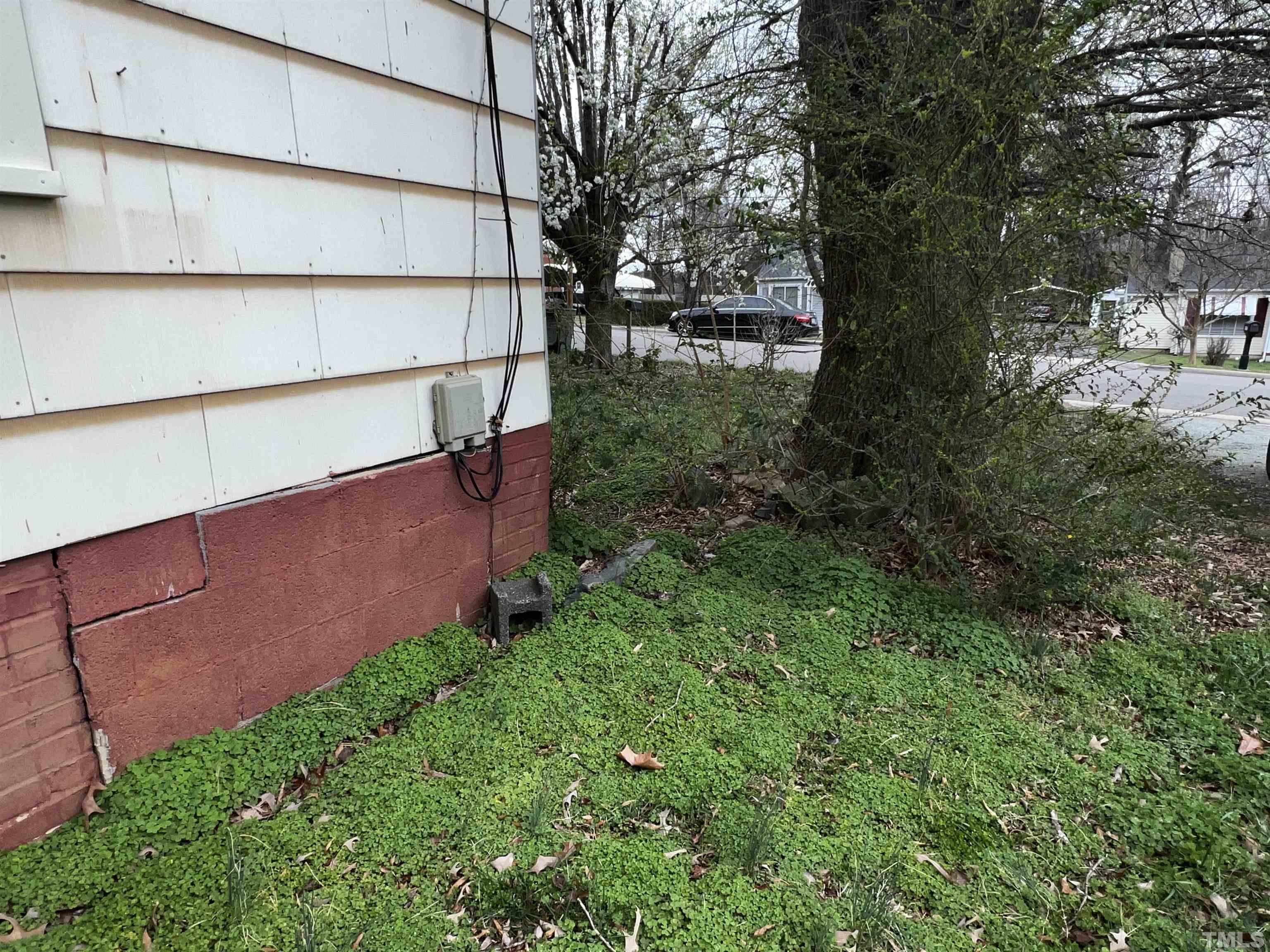 1259 Pointer Street Roxboro, NC 27573 - Photo 45 of 47 a view of a backyard with plants