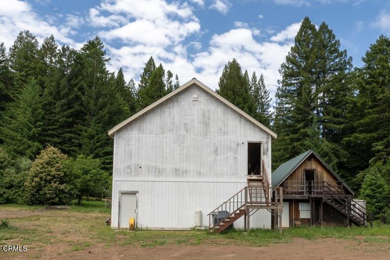 14480 Docker Hill Road Comptche, CA 95427 - Photo 26 of 27 a view of a house with a yard