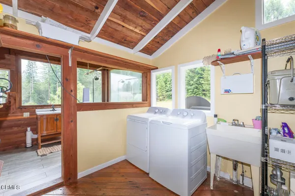 a utility room with dryer and washer