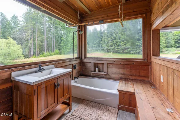 a bathroom with a sink and a bathtub