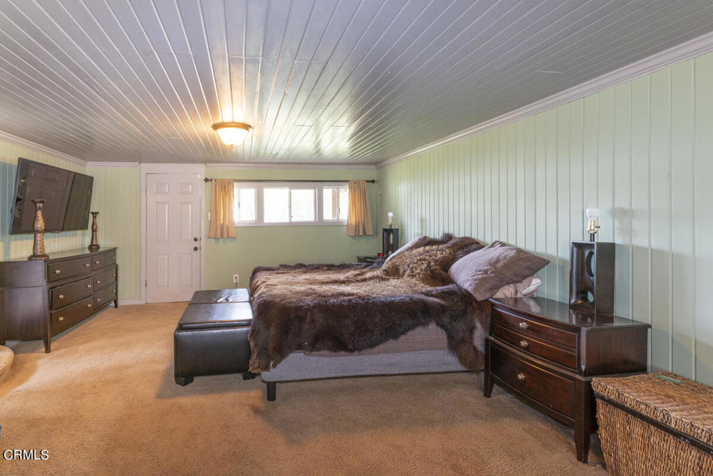 14480 Docker Hill Road Comptche, CA 95427 - Photo 9 of 27 a bedroom with furniture and a window