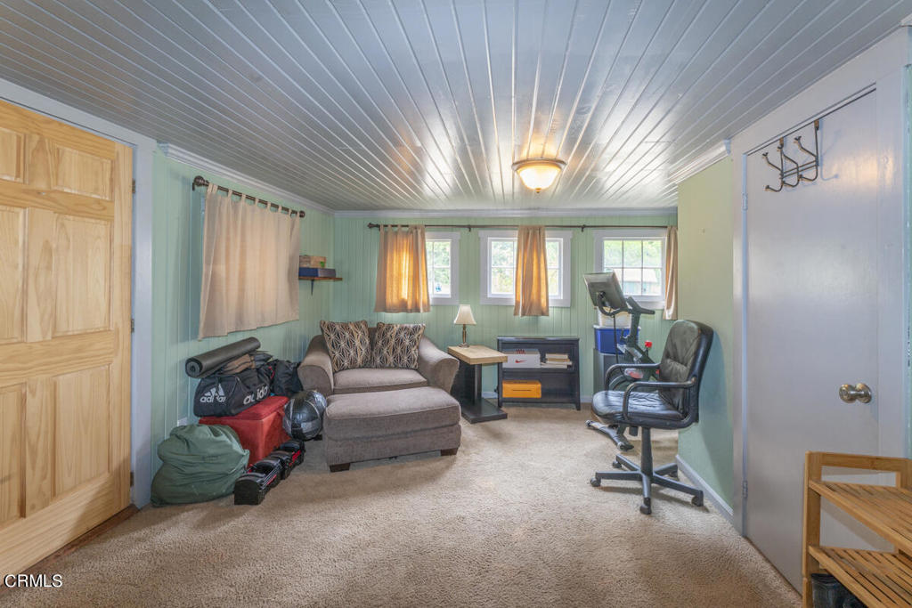 14480 Docker Hill Road Comptche, CA 95427 - Photo 10 of 27 a living room with furniture and a large window