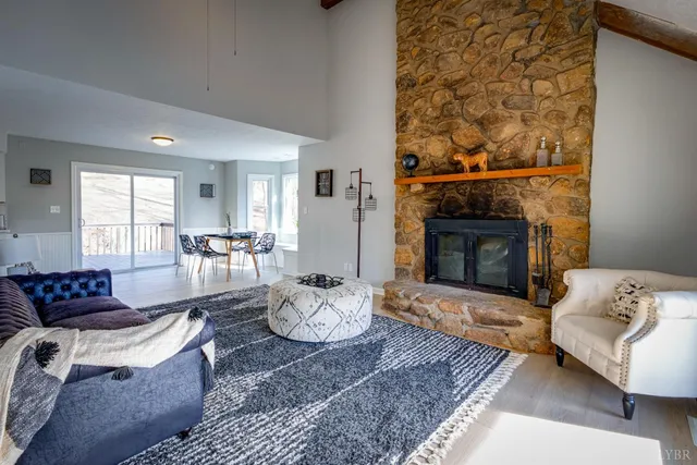 a living room with furniture and a table