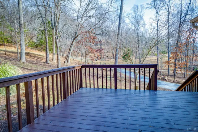 a view of a white house with a snow on the road
