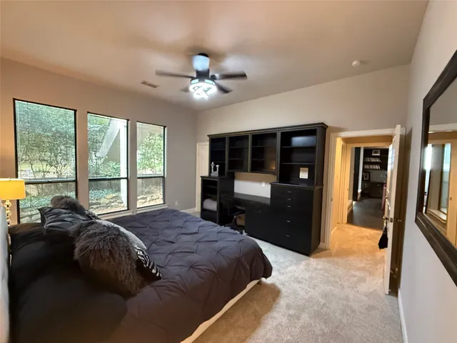 a bathroom with a bathtub and a sink