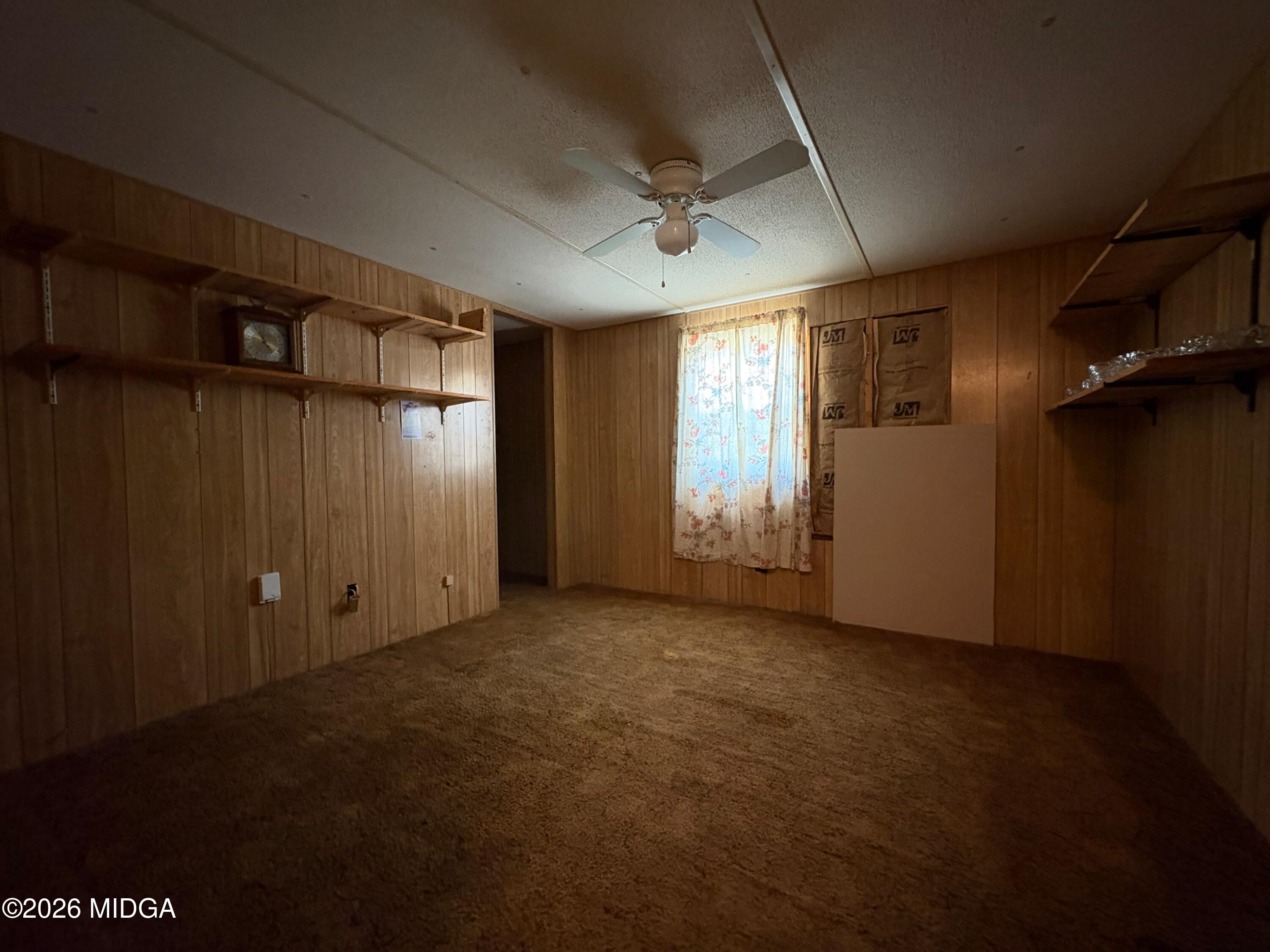 346 Quail Run Road Roberta, GA 31078 - Photo 12 of 15 an empty room with windows