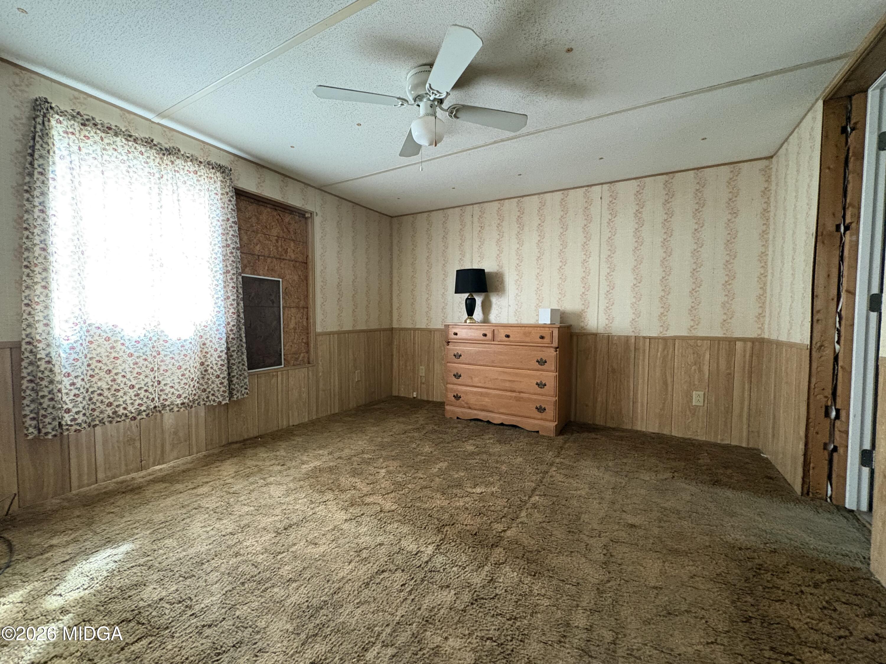 346 Quail Run Road Roberta, GA 31078 - Photo 5 of 15 a view of an empty room with a window