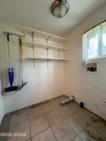 a view of a kitchen with a sink