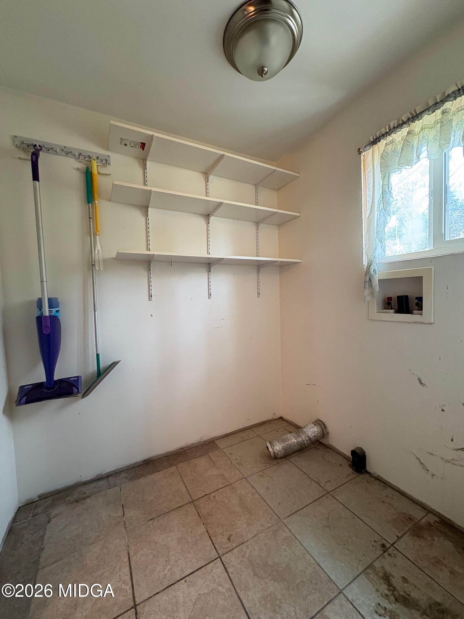 346 Quail Run Road Roberta, GA 31078 - Photo 8 of 15 a view of a storage & utility room