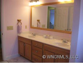446 Grandview Drive Rutherfordton, NC 28139 - Photo 12 of 12 a bathroom with a sink and a mirror