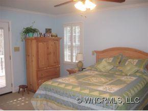 446 Grandview Drive Rutherfordton, NC 28139 - Photo 9 of 12 a bedroom with a bed and a window