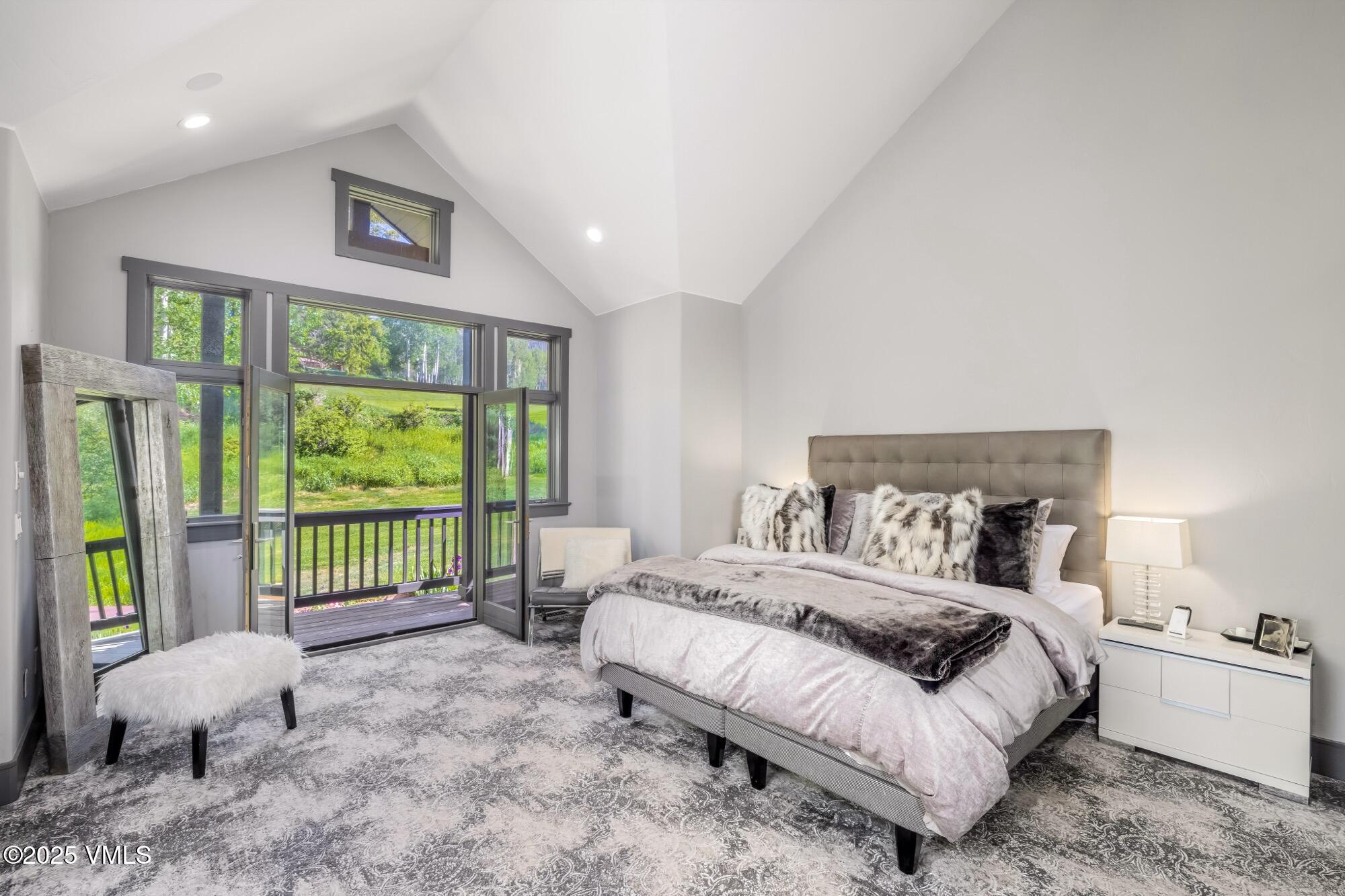 25 West Timber Drive Edwards, CO 81632 - Photo 22 of 55 a bedroom with a bed and a couch