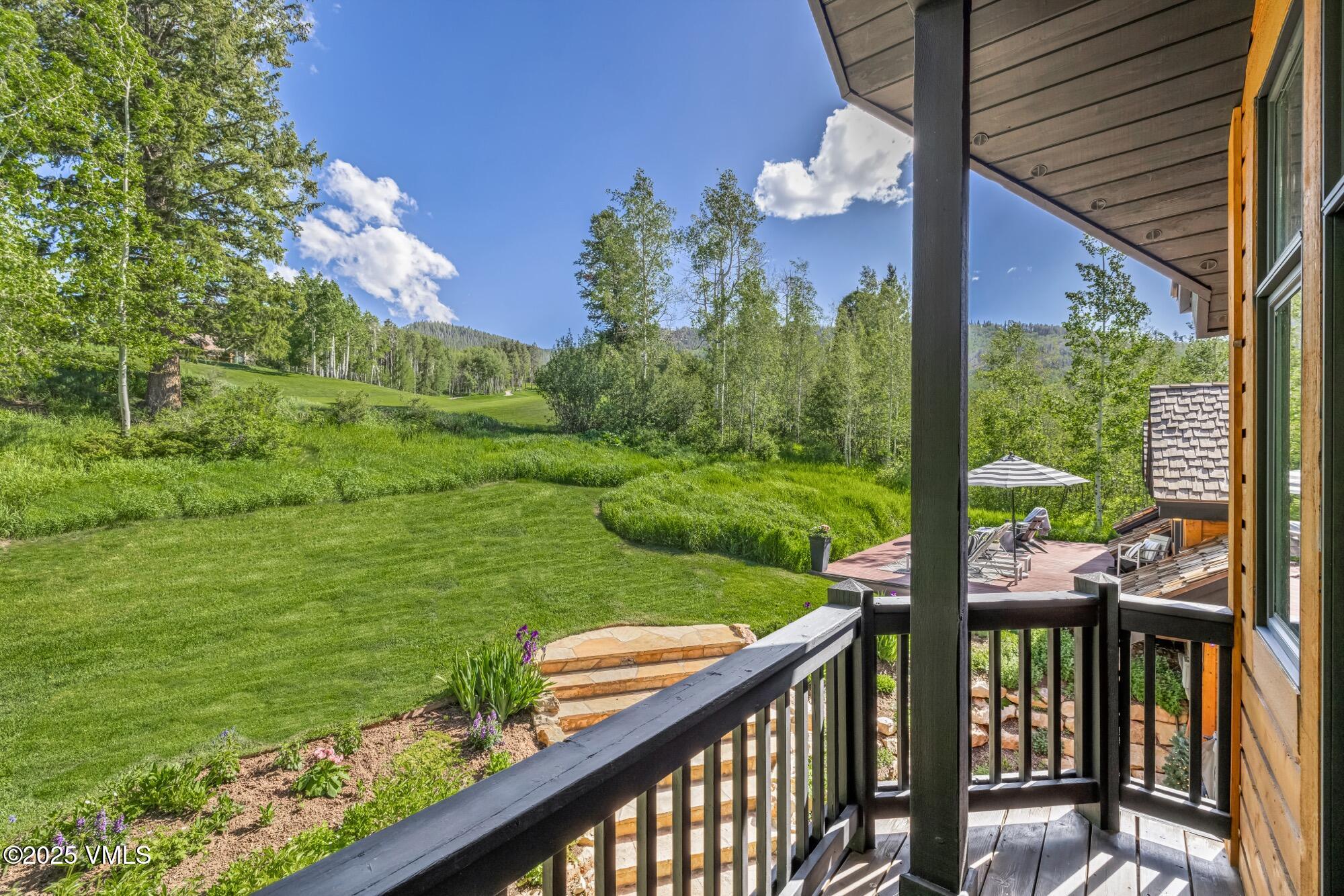 25 West Timber Drive Edwards, CO 81632 - Photo 23 of 55 a view of a wooden deck with a yard