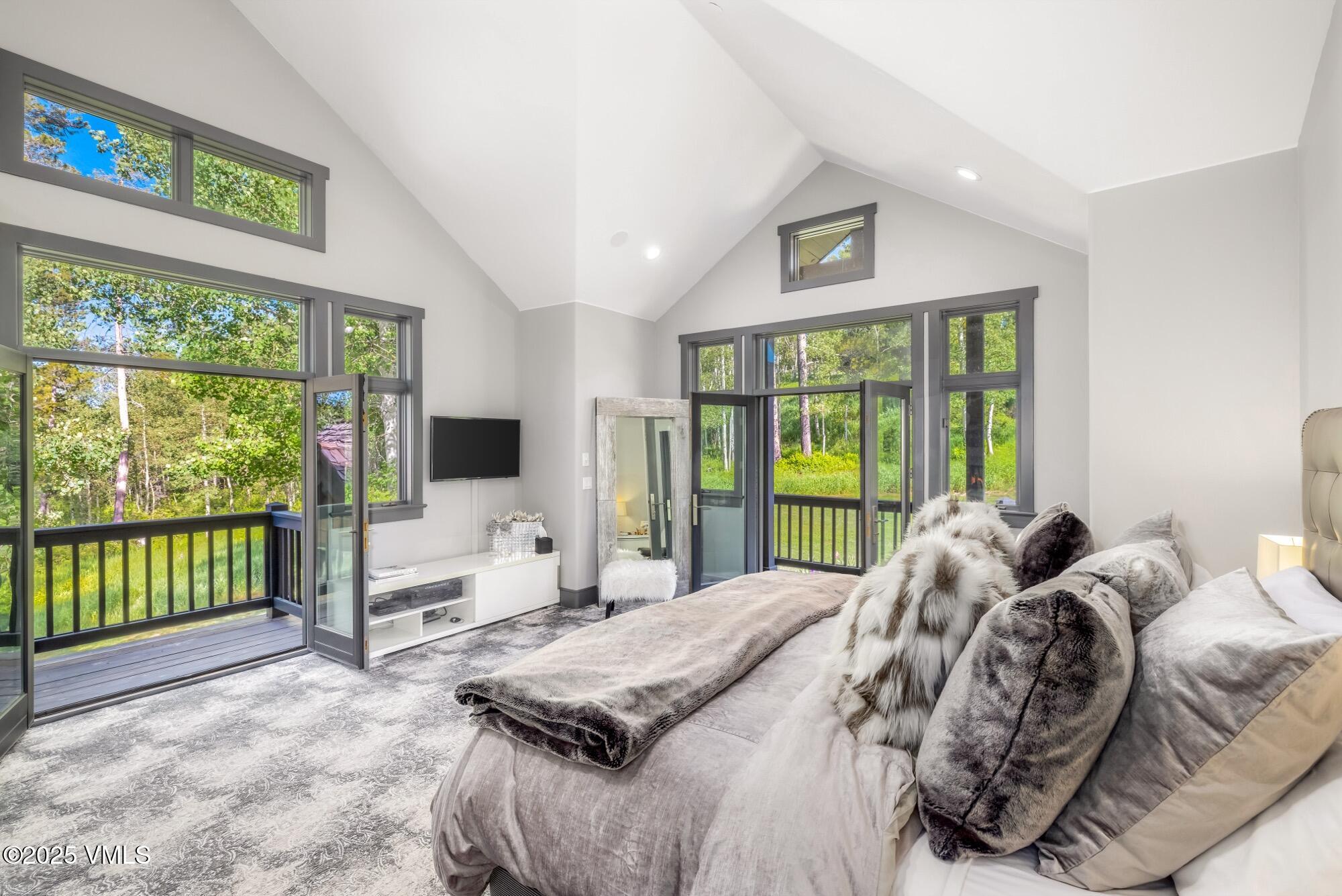 25 West Timber Drive Edwards, CO 81632 - Photo 24 of 55 a bed sitting in a bedroom next to a window