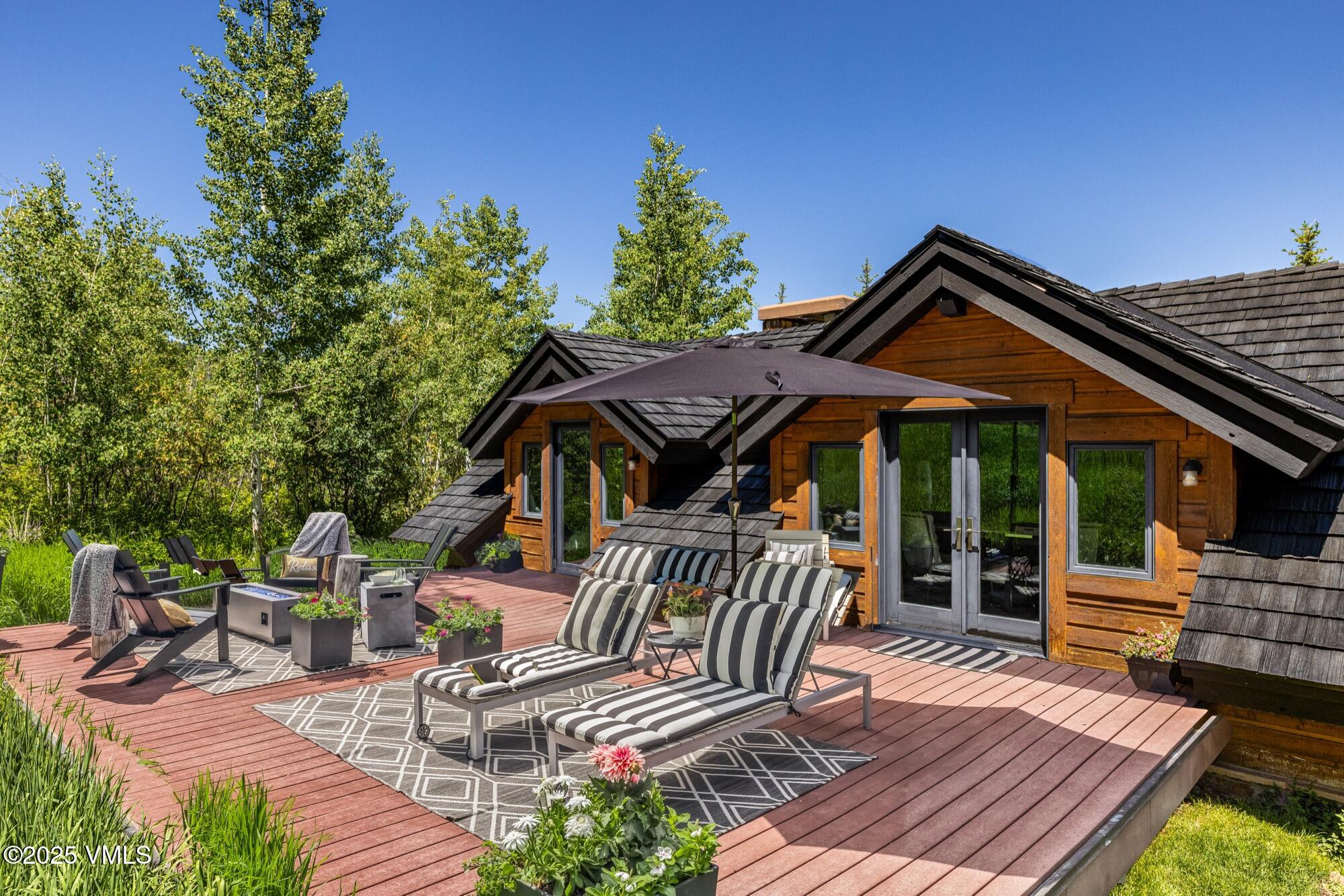25 West Timber Drive Edwards, CO 81632 - Photo 35 of 55 a view of a chairs and table in the patio