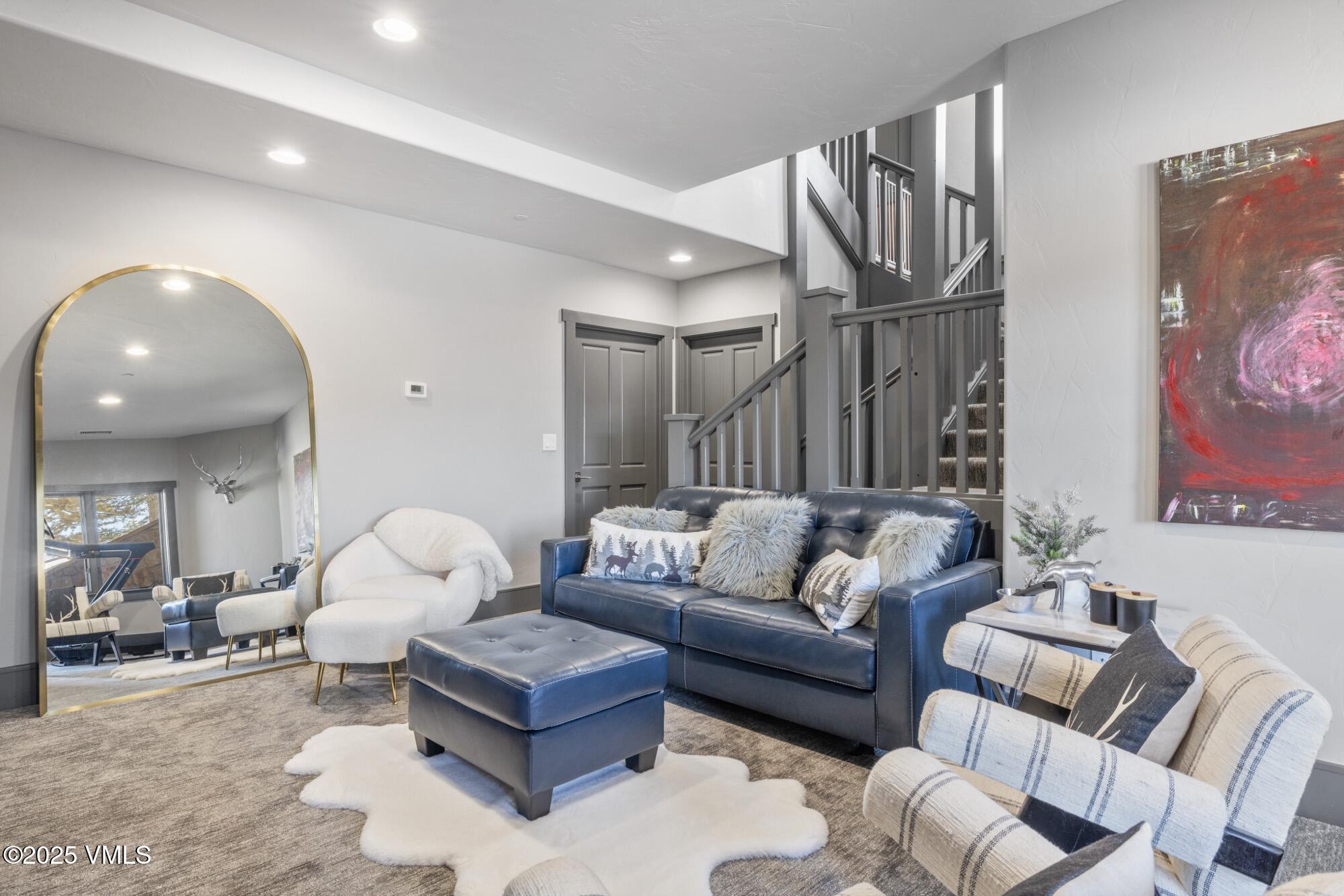 25 West Timber Drive Edwards, CO 81632 - Photo 37 of 55 a living room with furniture and a wooden floor