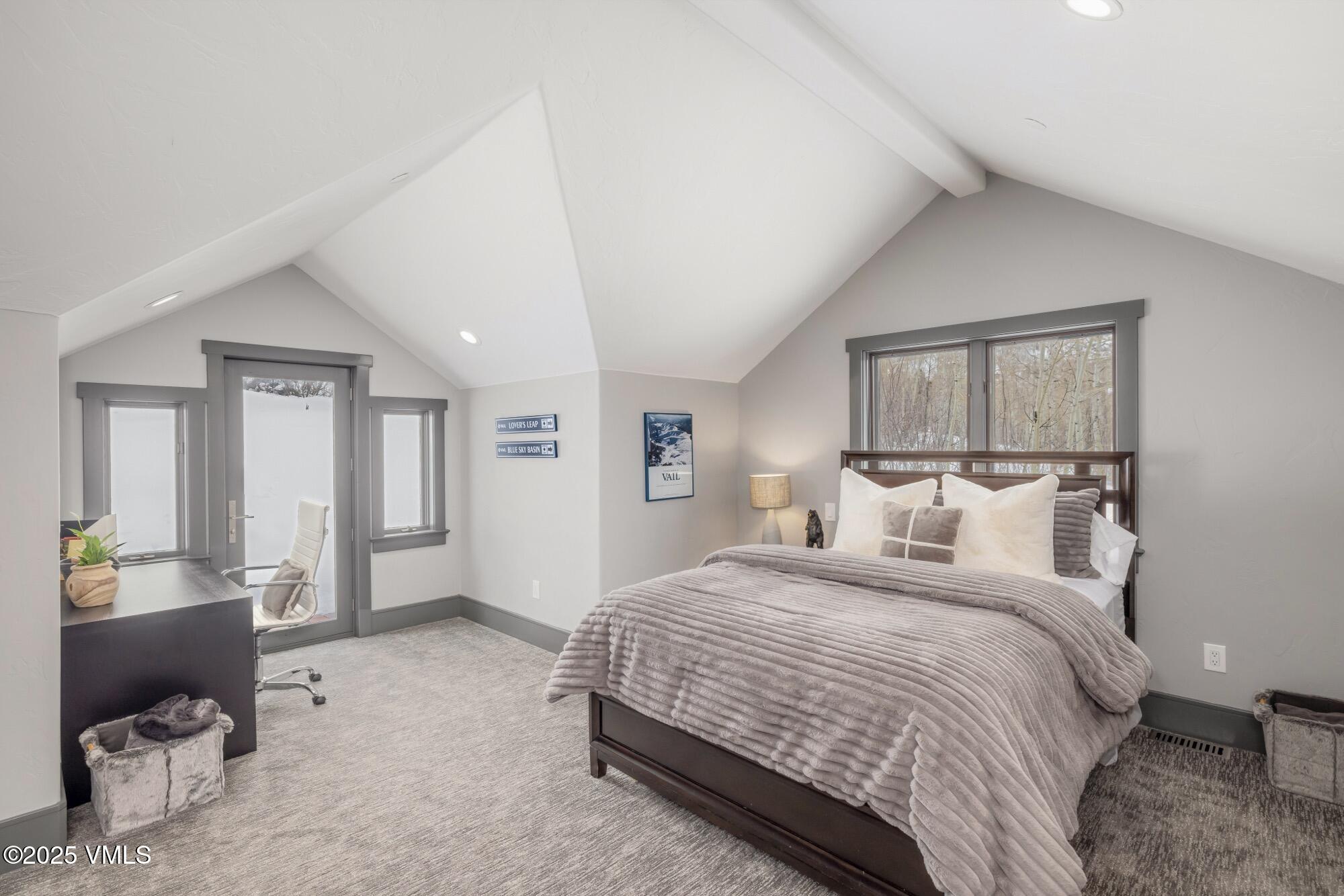 25 West Timber Drive Edwards, CO 81632 - Photo 38 of 55 a bedroom with a bed and a couch