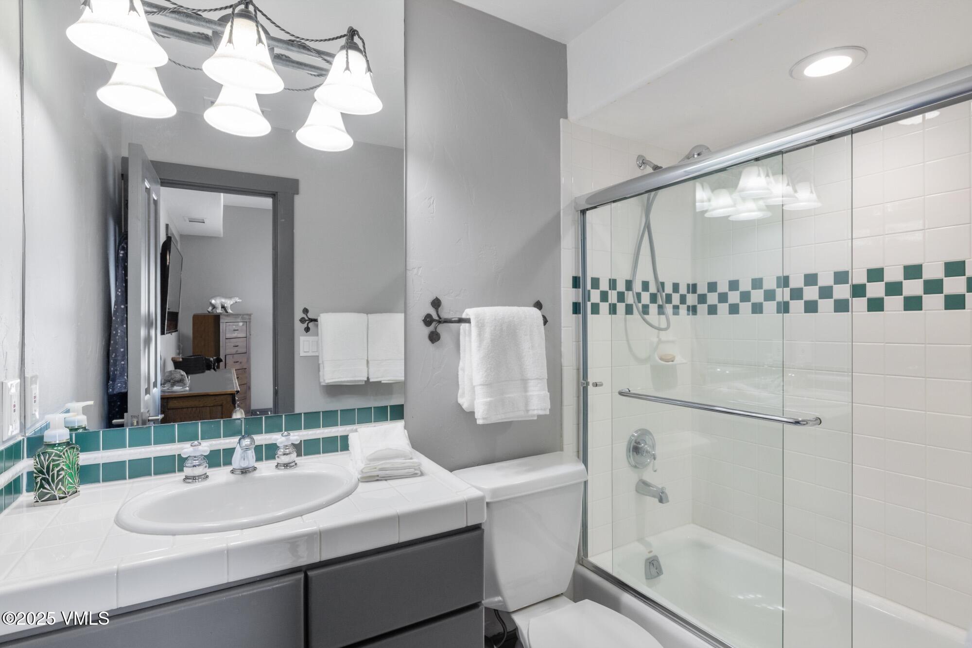 25 West Timber Drive Edwards, CO 81632 - Photo 44 of 55 a bathroom with a sink a toilet and shower
