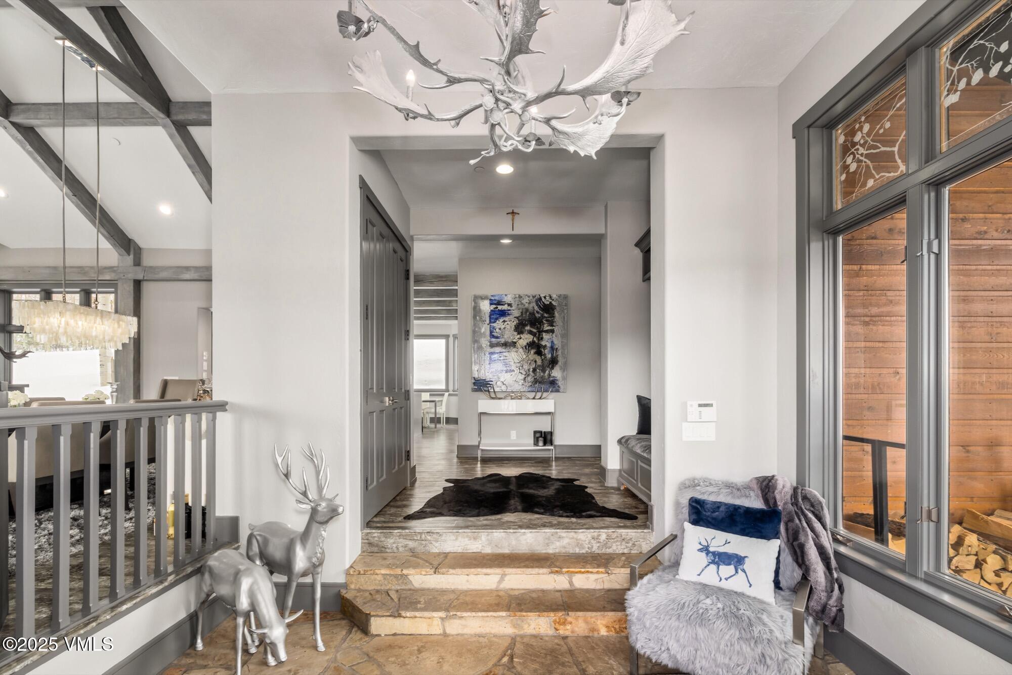 25 West Timber Drive Edwards, CO 81632 - Photo 49 of 55 a living room with furniture and a large window