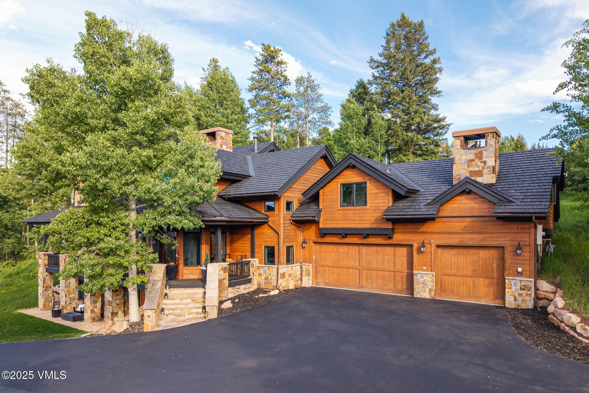 25 West Timber Drive Edwards, CO 81632 - Photo 51 of 55 a front view of a house with a yard