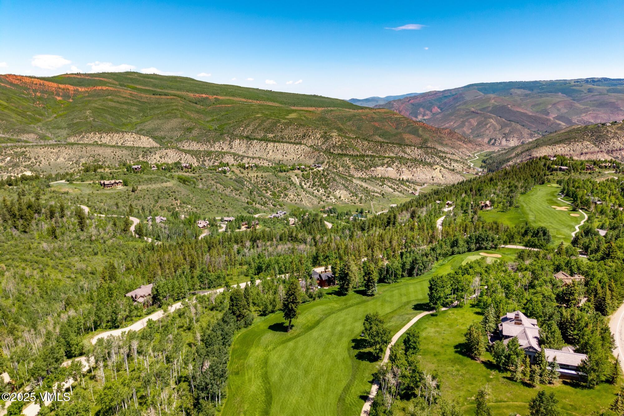 25 West Timber Drive Edwards, CO 81632 - Photo 55 of 55 a view of a lush green hillside and houses