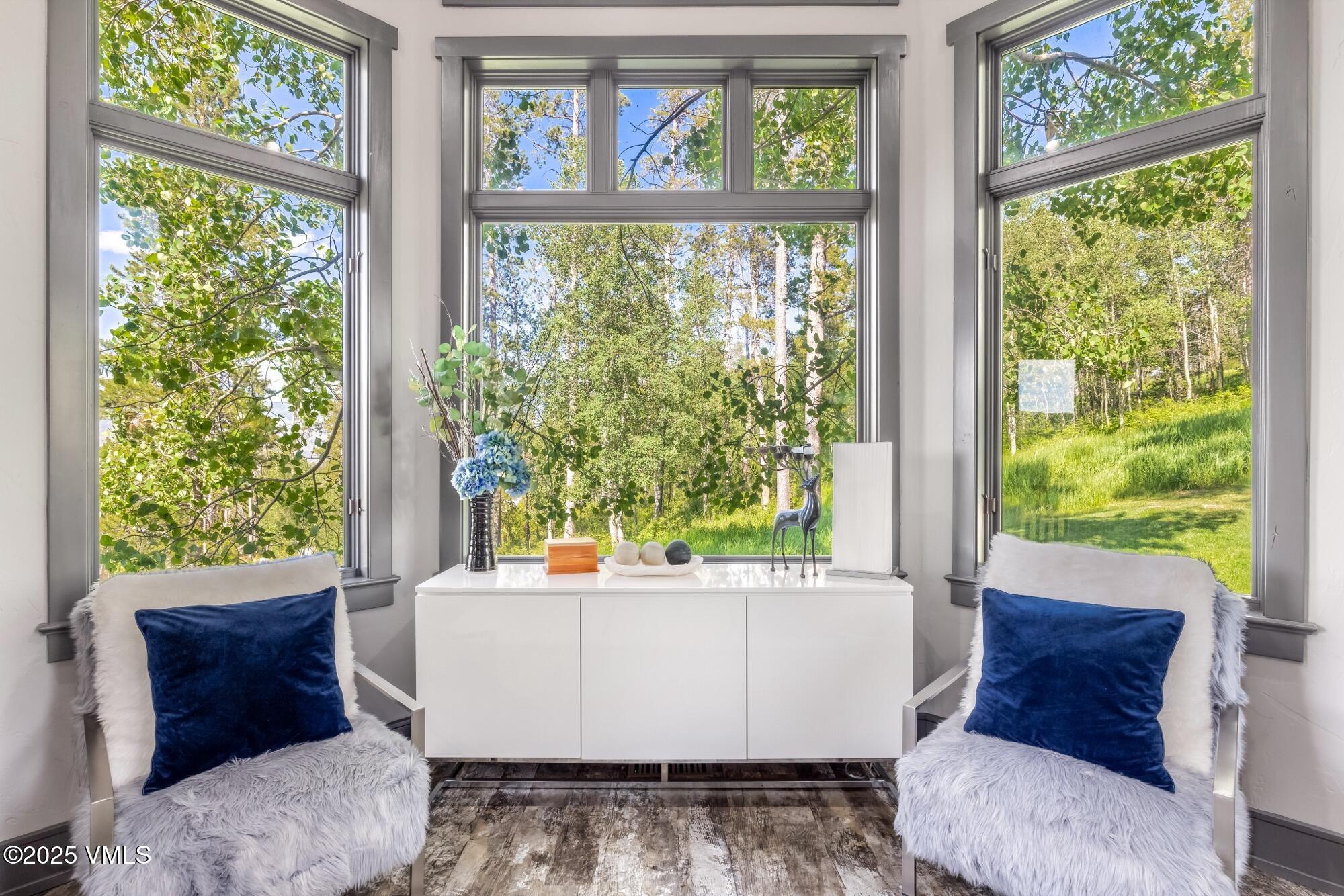 25 West Timber Drive Edwards, CO 81632 - Photo 9 of 55 a living room with a large window and a couch