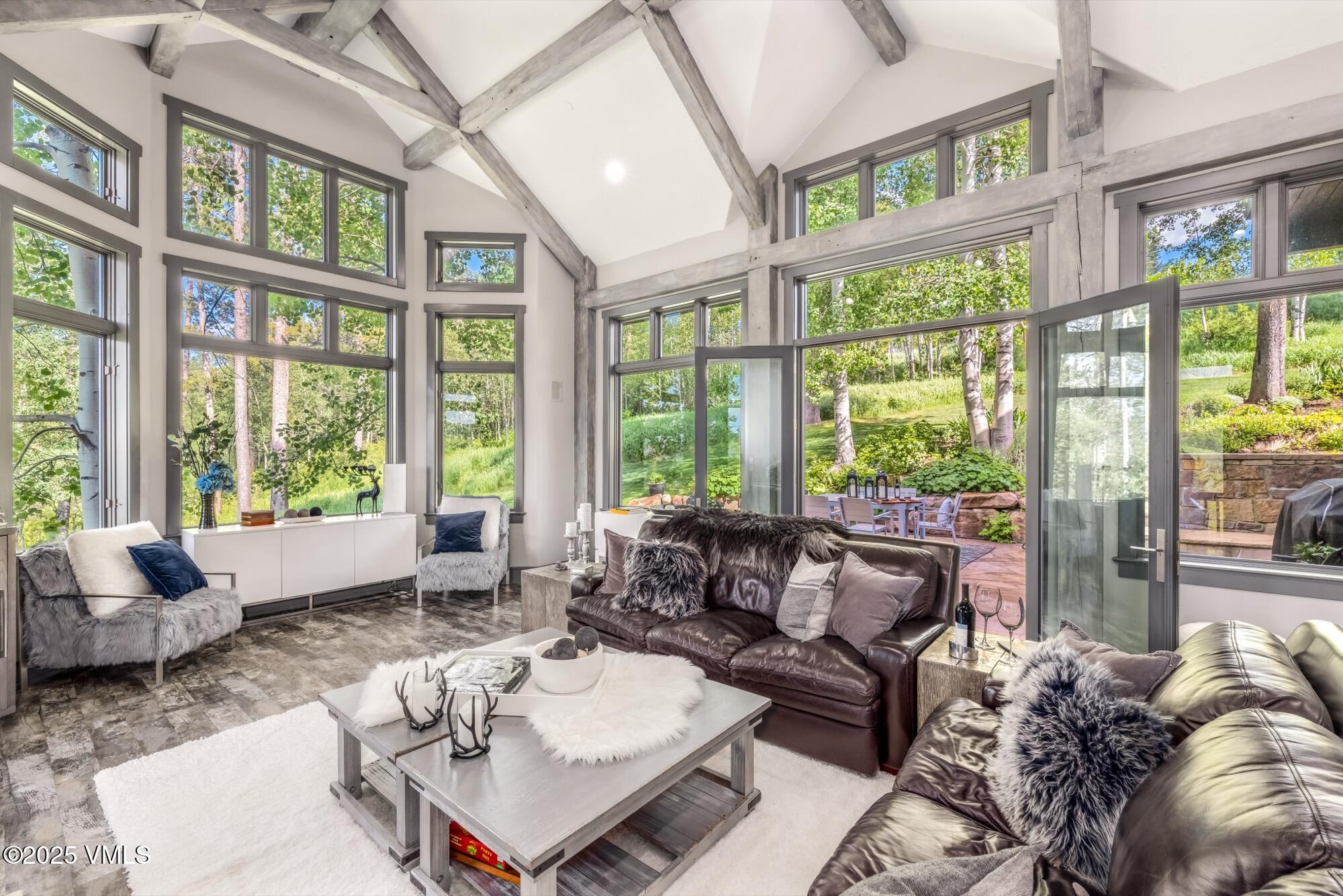 25 West Timber Drive Edwards, CO 81632 - Photo 10 of 55 a living room with furniture and floor to ceiling windows