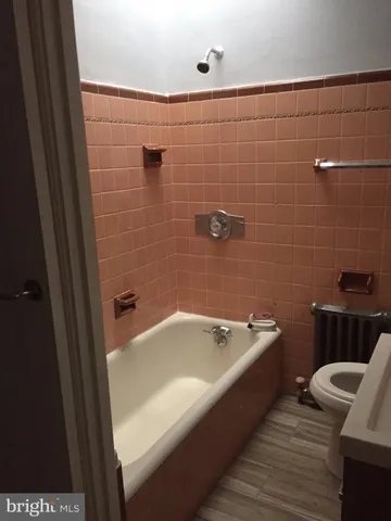 a bathroom with a bathtub
