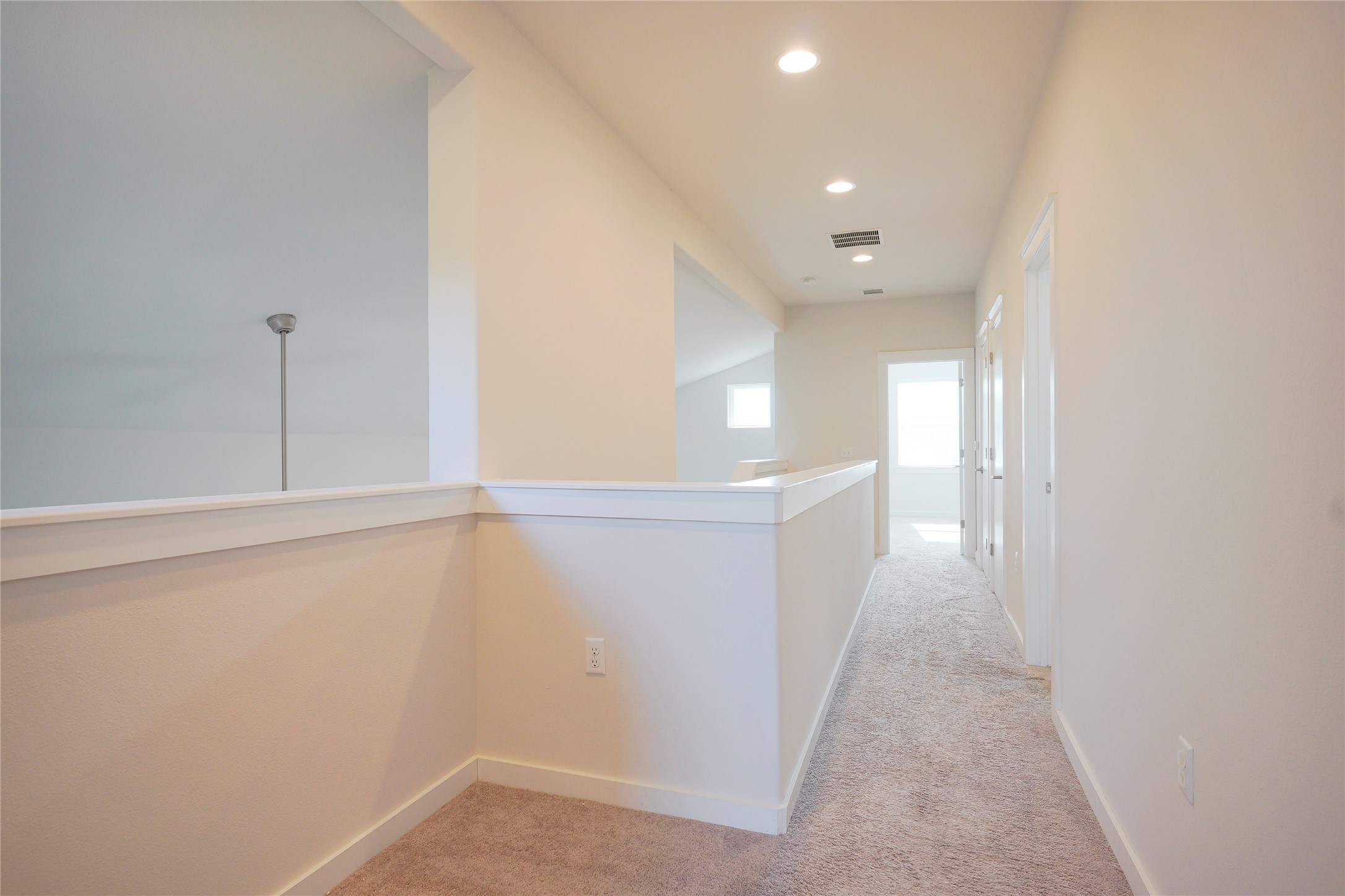 8945 Parker Ranch Circle, Unit A Austin, TX 78748 - Photo 16 of 25 a view of a hallway with an empty room