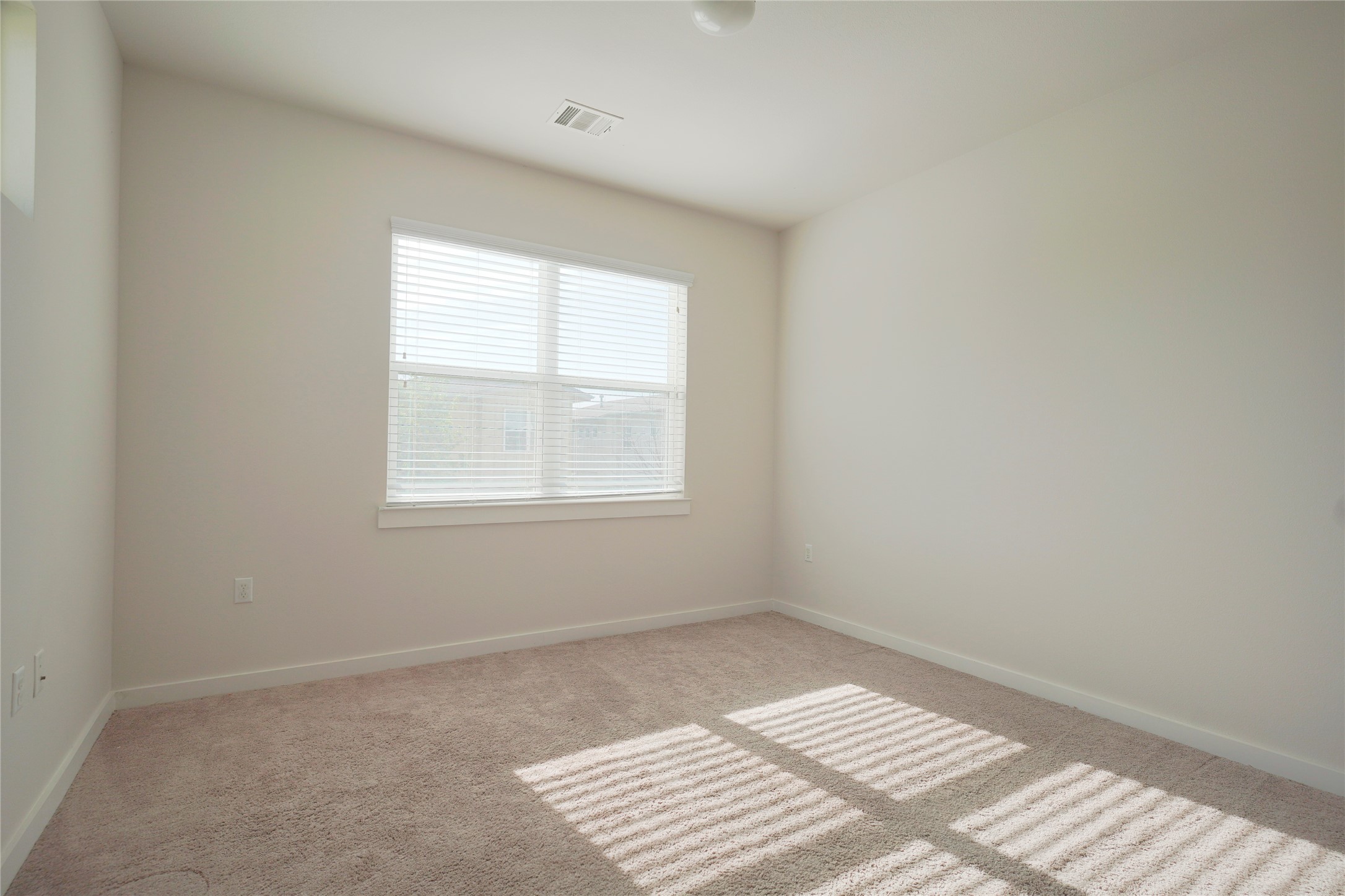 8945 Parker Ranch Circle, Unit A Austin, TX 78748 - Photo 20 of 25 an empty room with a window