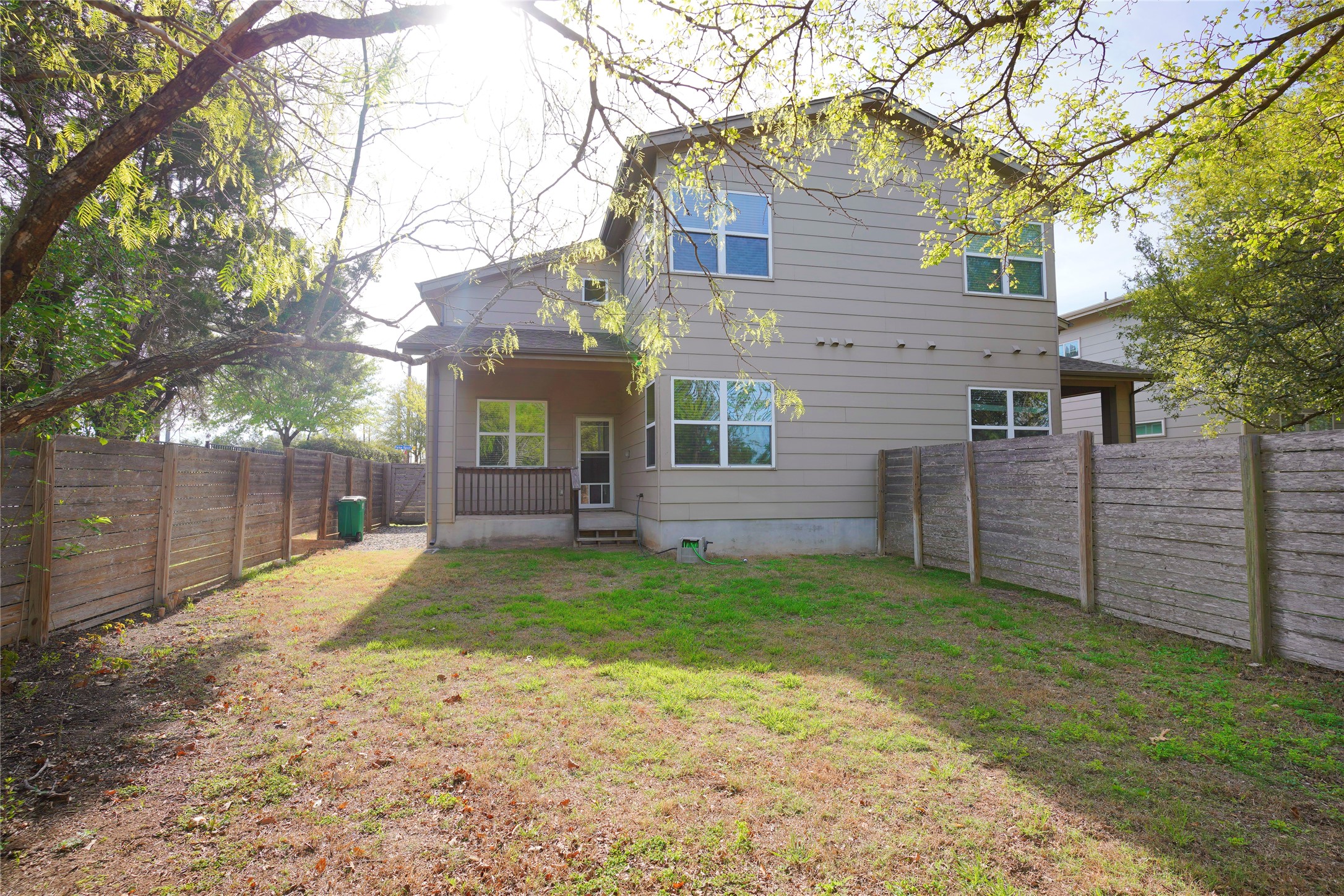 8945 Parker Ranch Circle, Unit A Austin, TX 78748 - Photo 25 of 25 a view of a back yard of the house