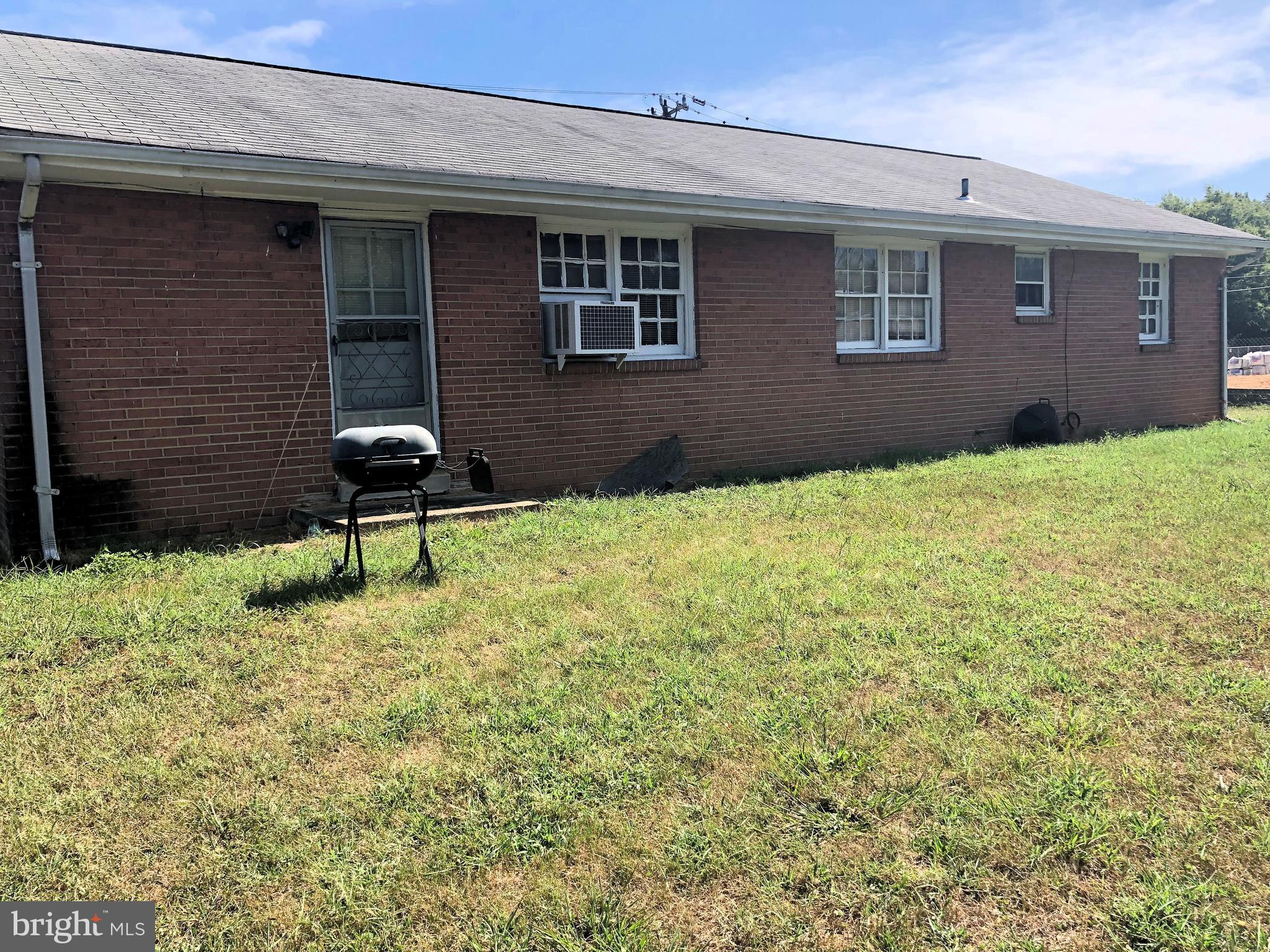 7709 Armistead Road Lorton, VA 22079 - Photo 12 of 13 All brick home on large, mostly level, back yard