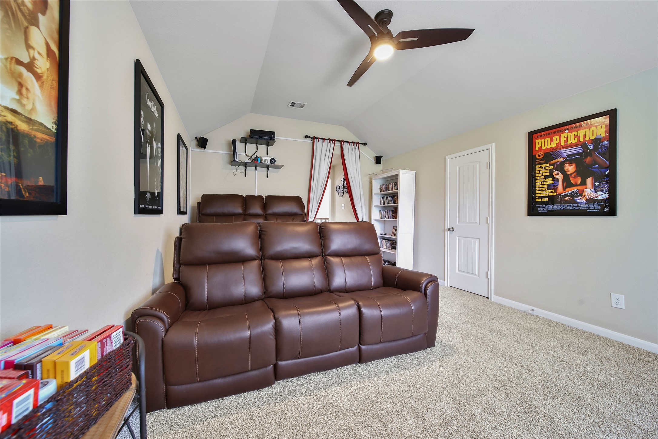 9223 Wapiti Trail Conroe, TX 77303 - Photo 31 of 45 a living room with furniture and a flat screen tv