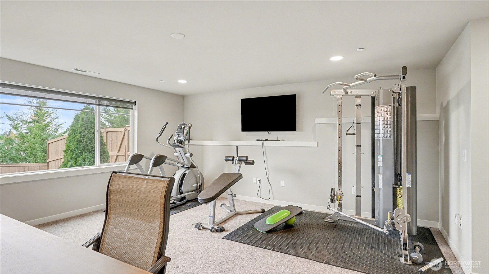 20403 93rd Place South, Unit 902 Kent, WA 98031 - Photo 14 of 40 a view of a livingroom with furniture and a flat screen tv